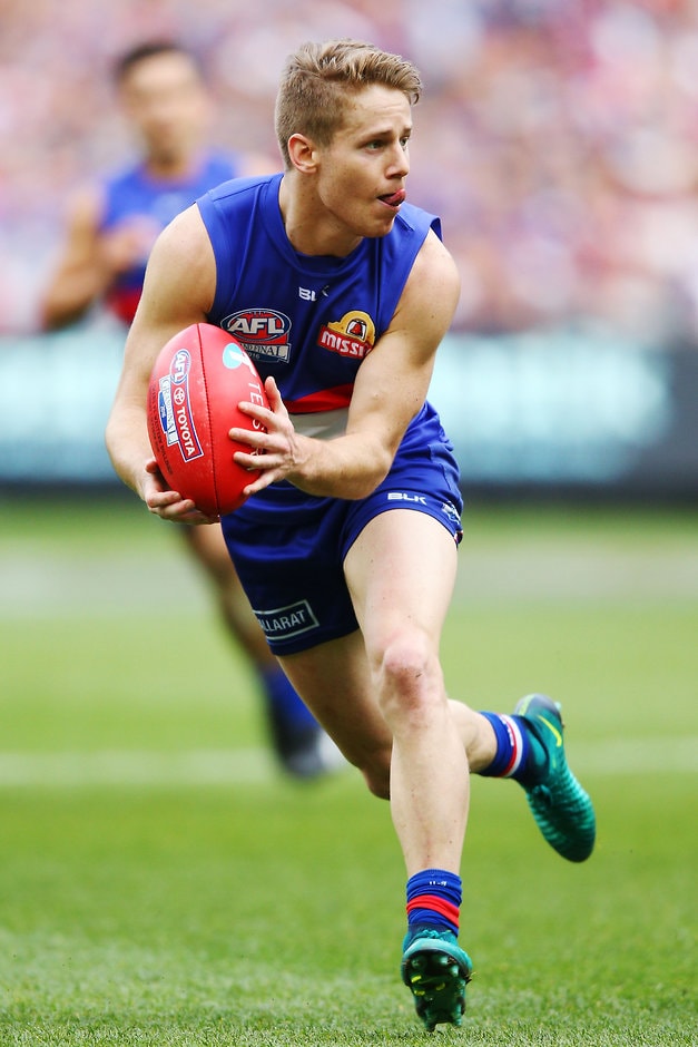 AFL 2016 Toyota AFL Grand Final - Sydney v Western Bulldogs MELBOURNE, AUSTRALIA - OCTOBER 01: Lachie Hunter of the Bulldogs looks upfield during the 2016 Toyota AFL Grand Final match between the Sydney Swans and the Western Bulldogs at the Melbourne Cricket Ground on October 01, 2016 in Melbourne, Australia. (Photo by Michael Dodge/AFL Media)